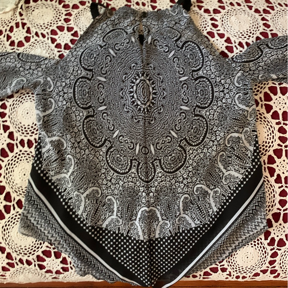 Black and White blouse with underlining.